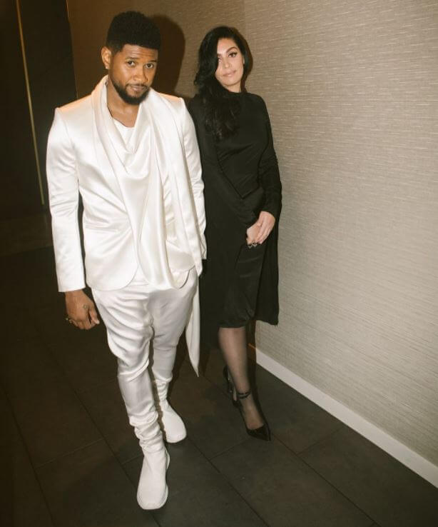 Usher Cinco Raymond V's Father, Usher, with his girlfriend.